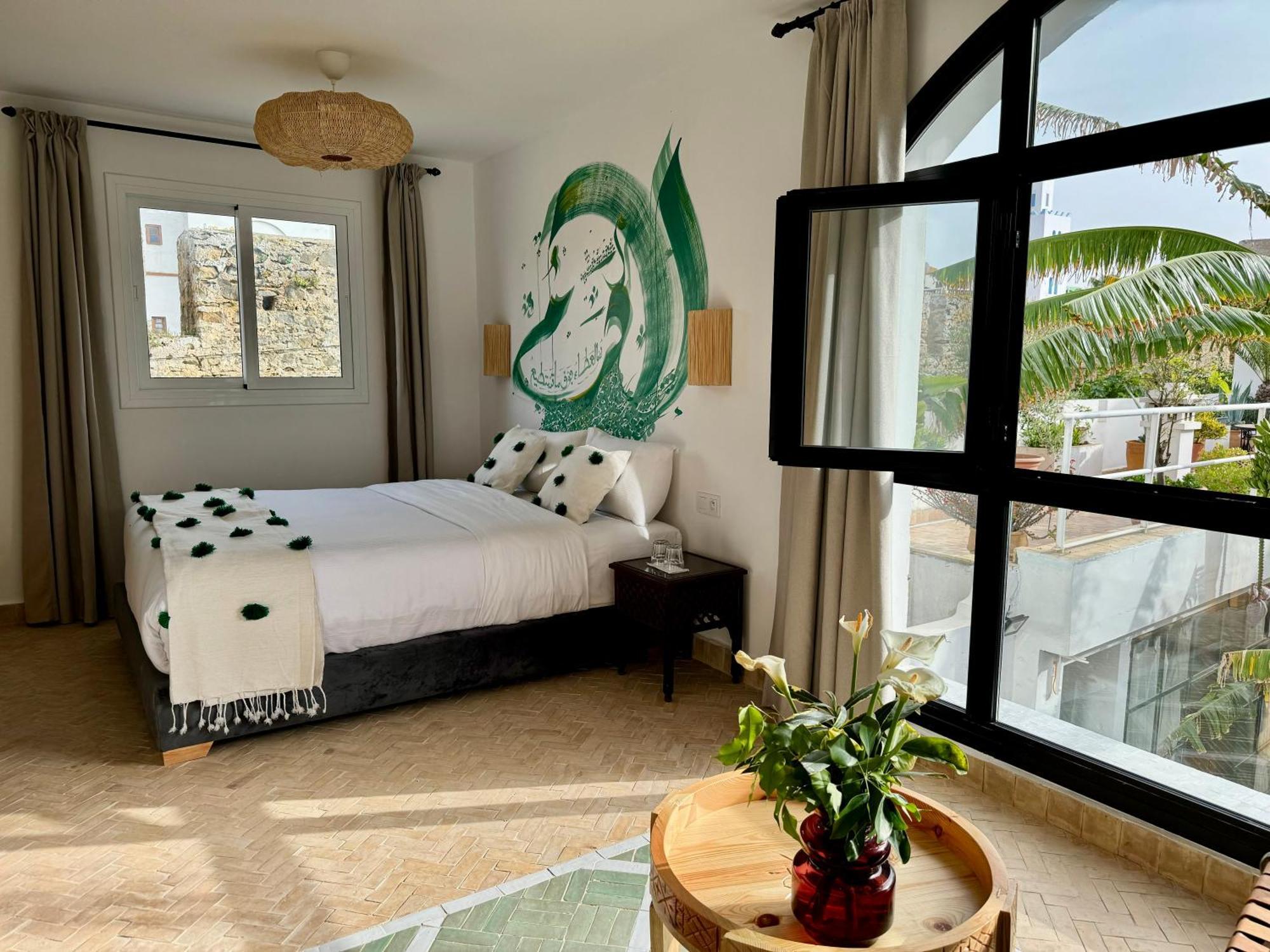 Riad Oasis D'Асила Екстериор снимка